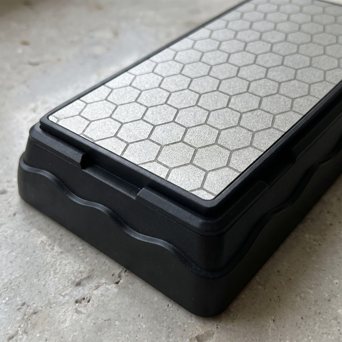 1000 Grit Diamond Knife Sharpening Stone with Non-Slip Base - close-up of the honeycomb diamond surface and black non-slip base