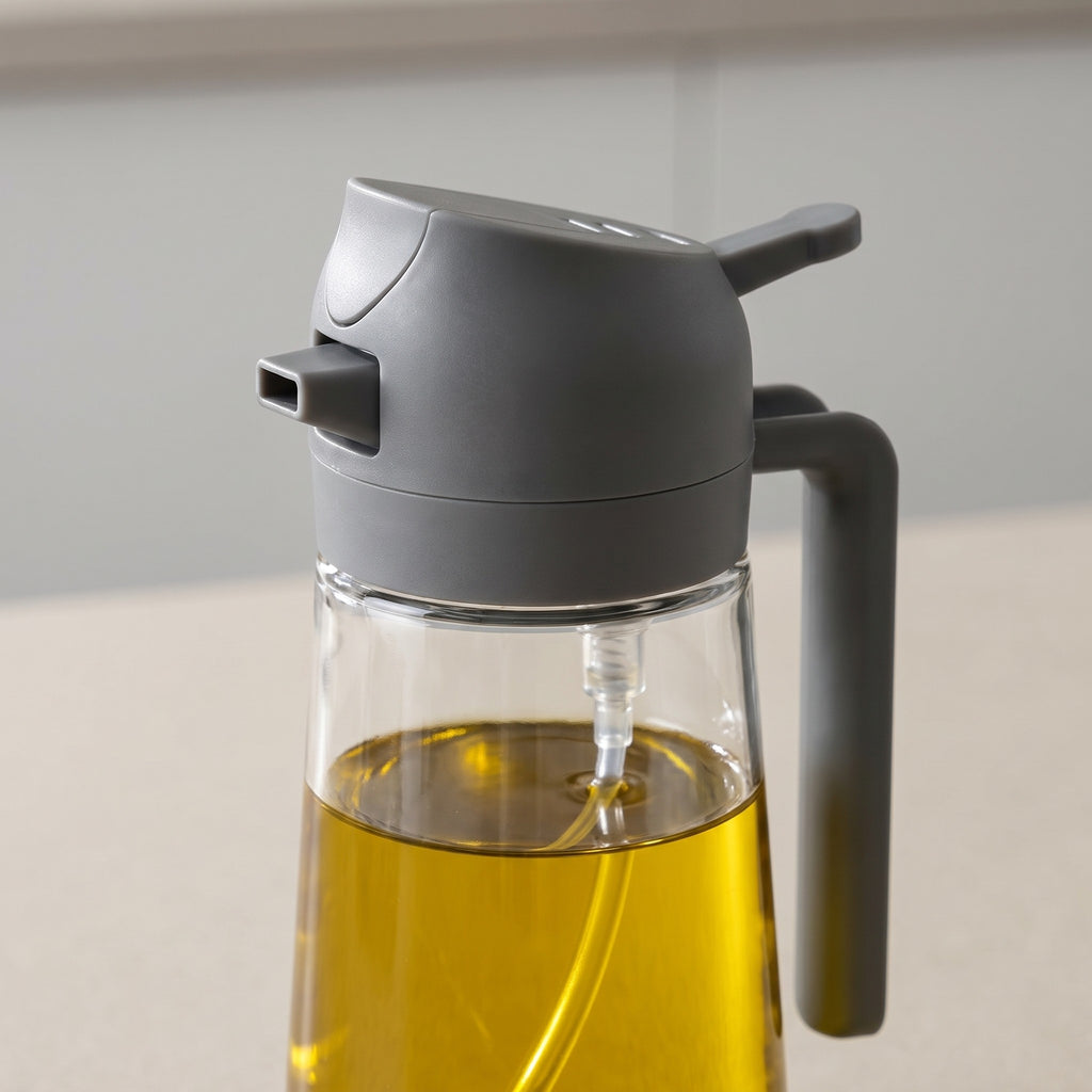 2-in-1 Oil Sprayer and Pourer for Cooking - close-up of the pour spout, spray trigger and glass bottle