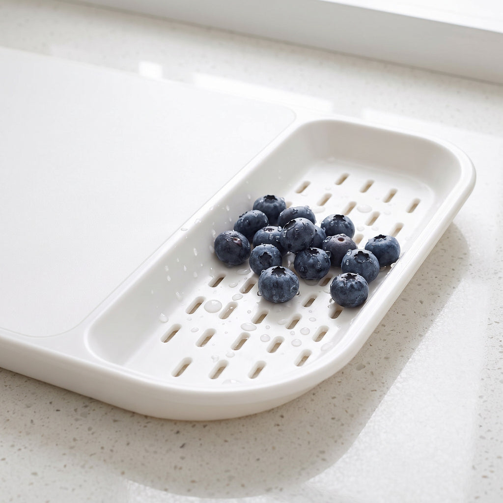 3-in-1 Draining Cutting Board with Raised Edges and Handles - close-up of the slotted draining section
