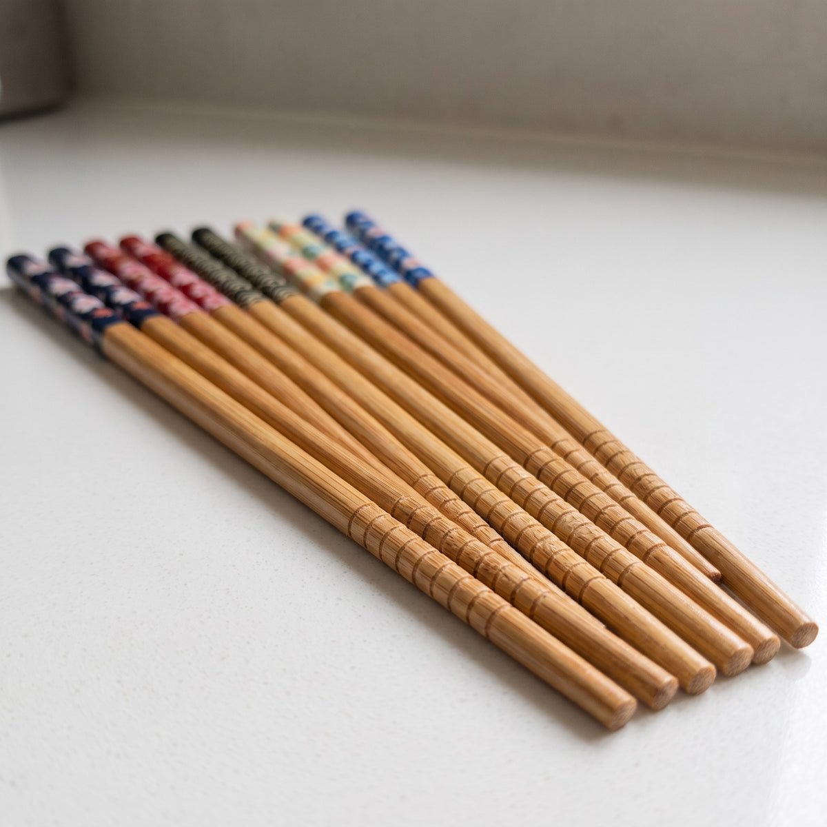 5-Pair Reusable Bamboo Chopsticks Set with Nonslip Tips - close-up of the bamboo grain and textured nonslip tips