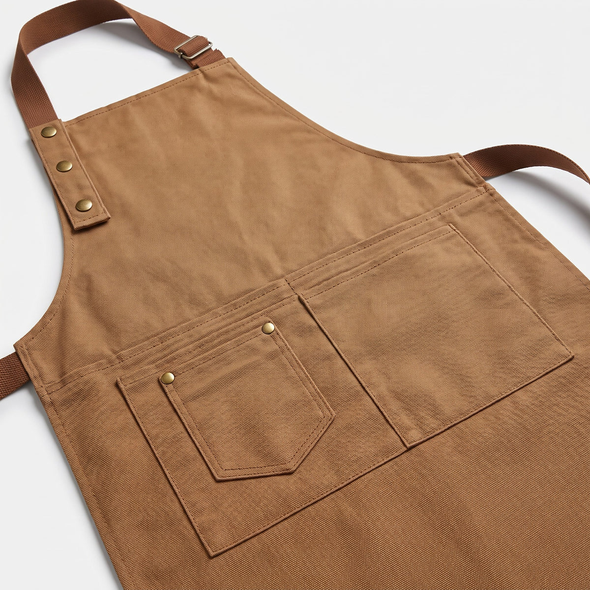 Canvas Work Apron with Multiple Pockets and Towel Loop - close-up of the canvas weave, pocket stitching and brass rivets