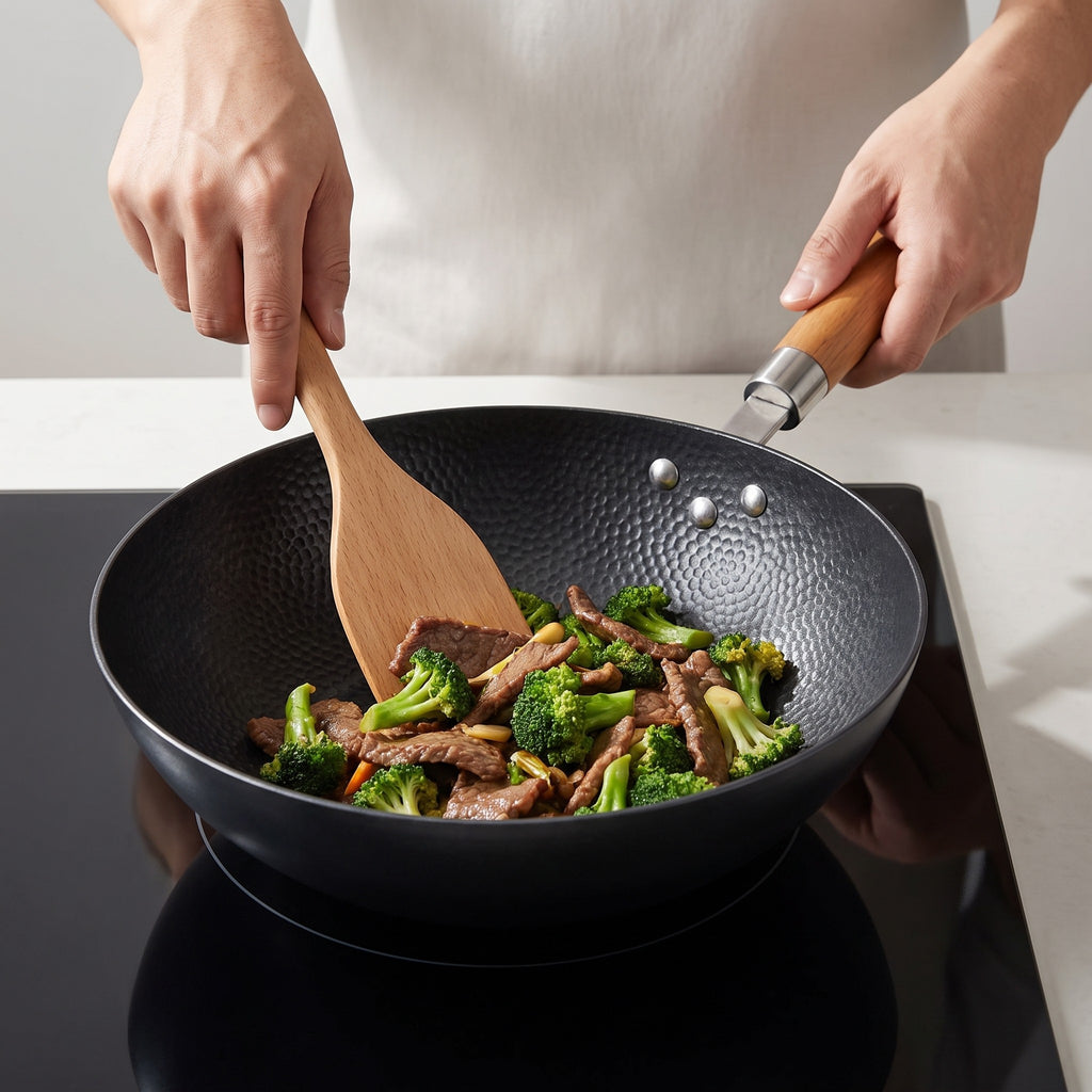 Cast Aluminum Non-Stick Wok with Wooden Handle in use, stir-frying beef and broccoli