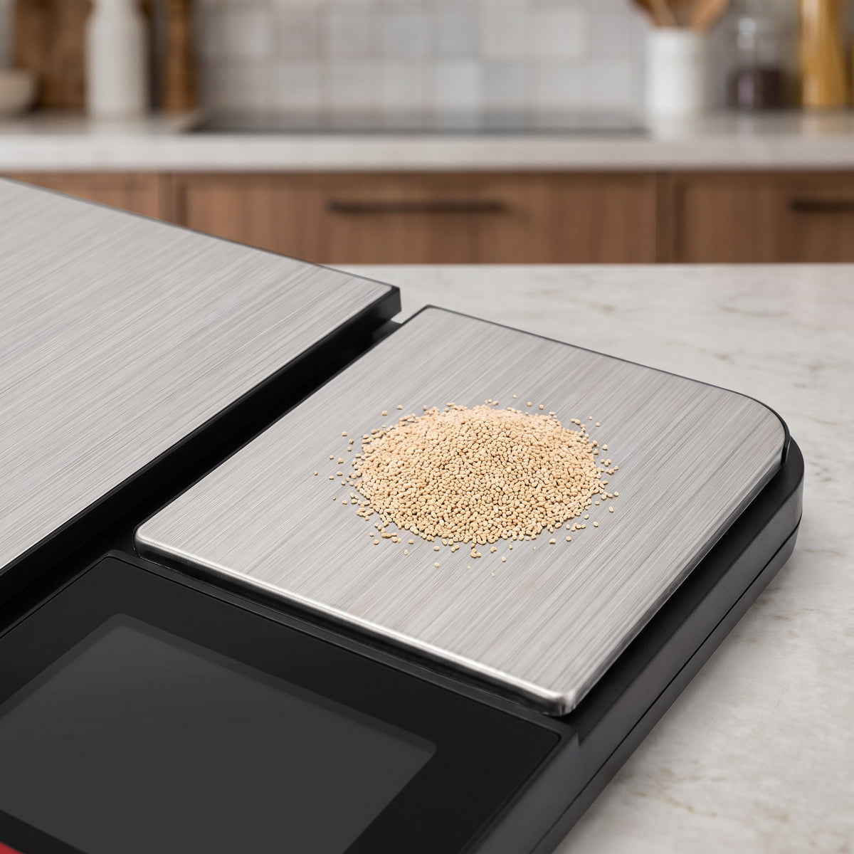 Dual Platform Kitchen Scale with 5 kg and 500 g Capacity - close-up of the brushed stainless steel precision platform with dry yeast