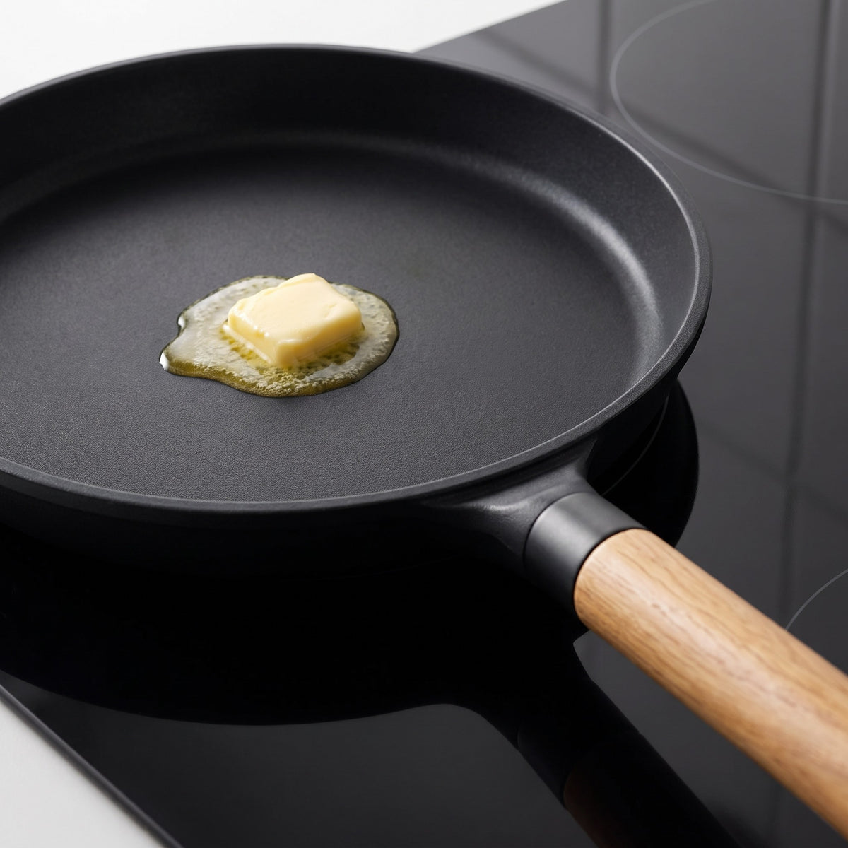 Induction Non-Stick Crepe Pan with Low Sloped Edges - close-up of the non-stick surface and low sloped edge