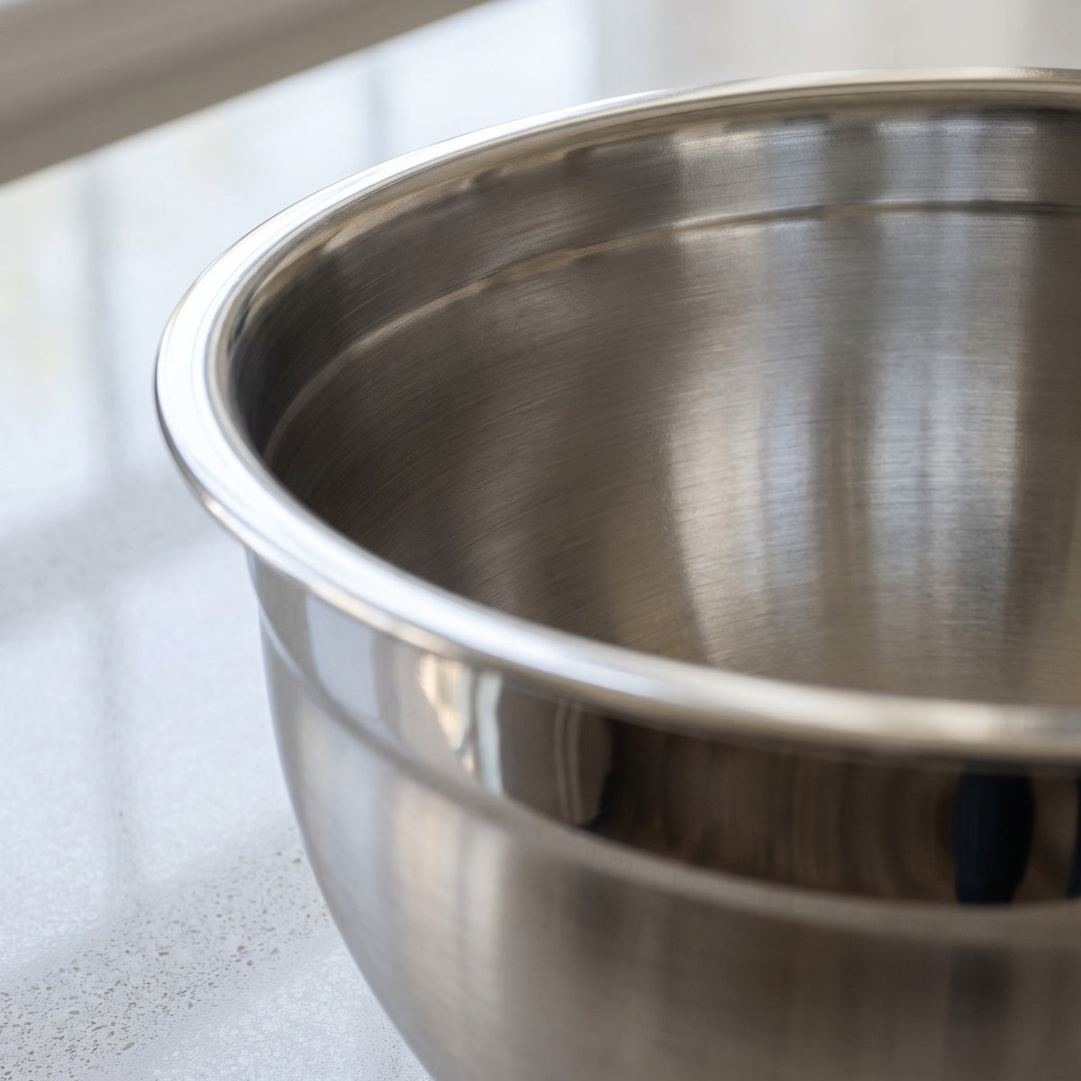 Lightweight 18/8 Stainless Steel Mixing Bowls - close-up of the rolled rim and polished 18/8 stainless steel