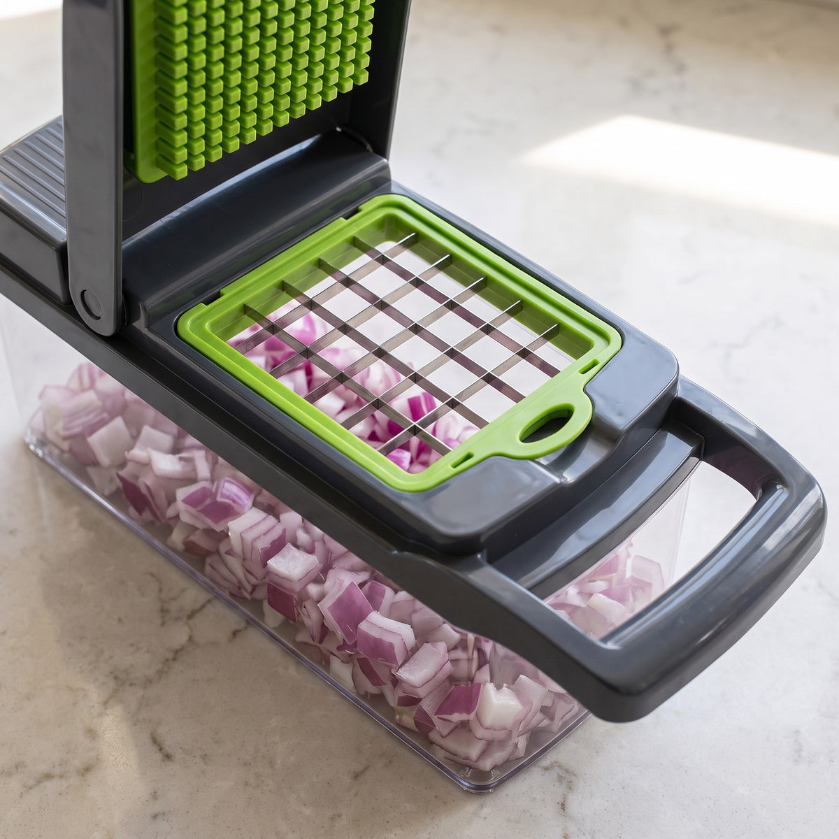 Manual Vegetable Chopper Set with Cutting Grid - close-up of the cutting grid blades over the clear container