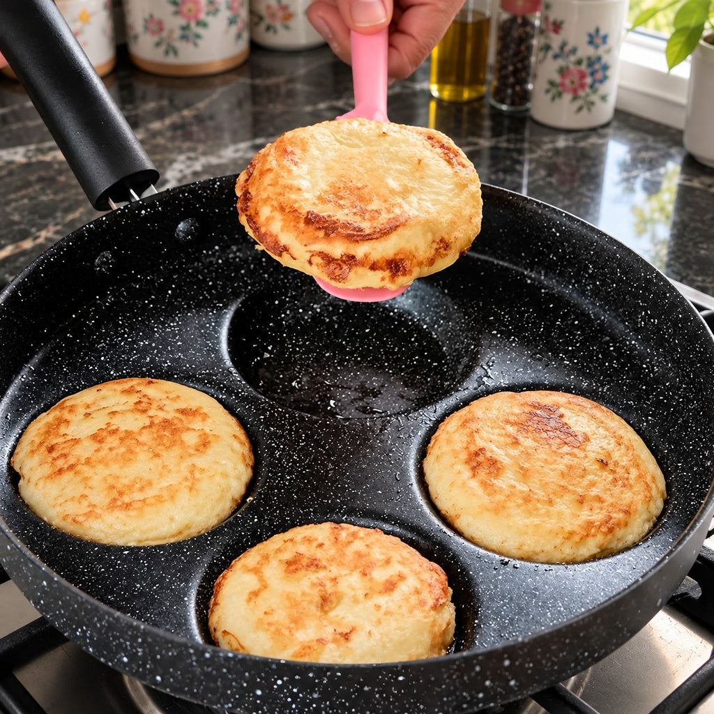 Multi-Cup Non-Stick Pancake Pan for Eggs and Blinis in a home kitchen