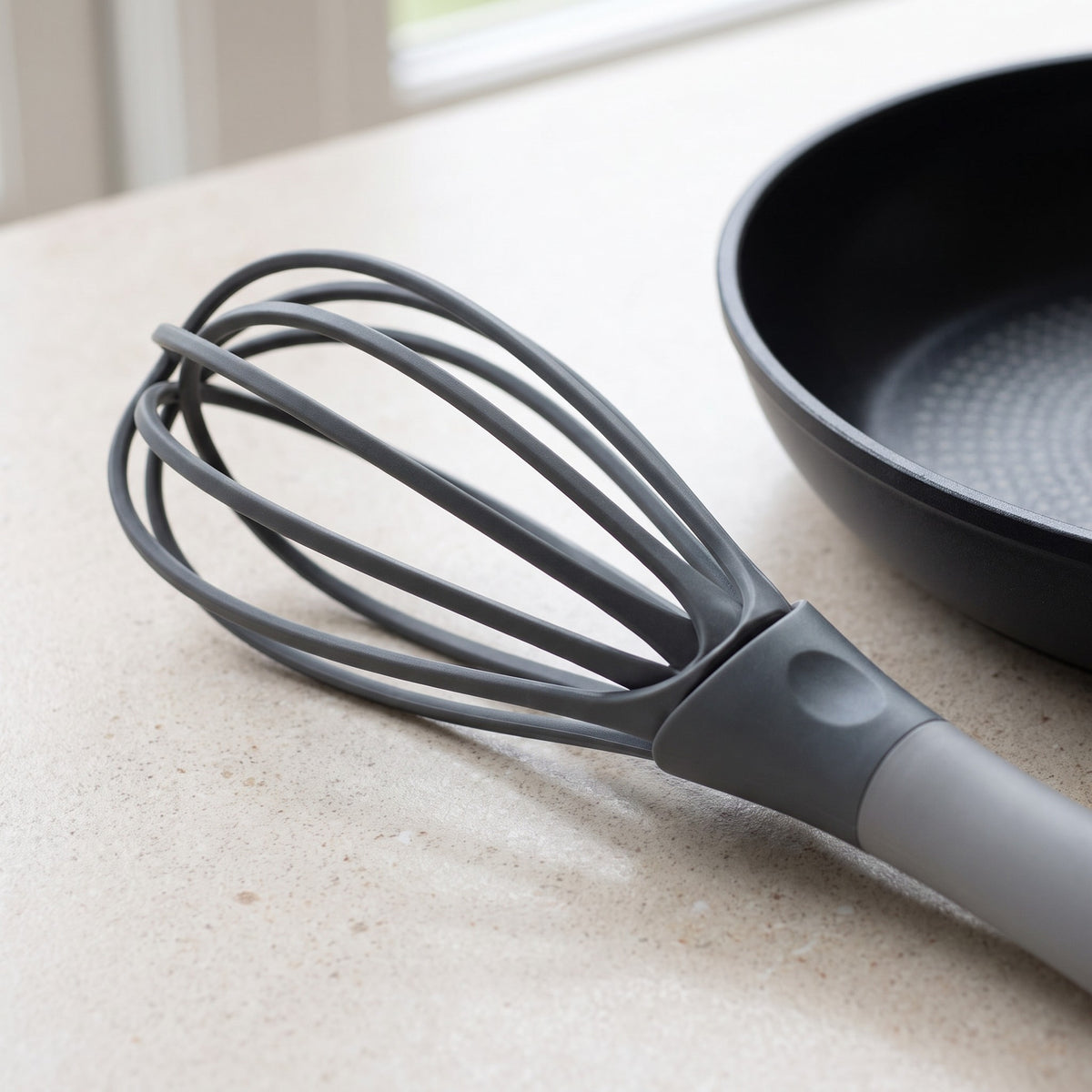 Non-Scratch Flat Roux Whisk with Long Handle - close-up of the gray non-scratch coated loops and long handle