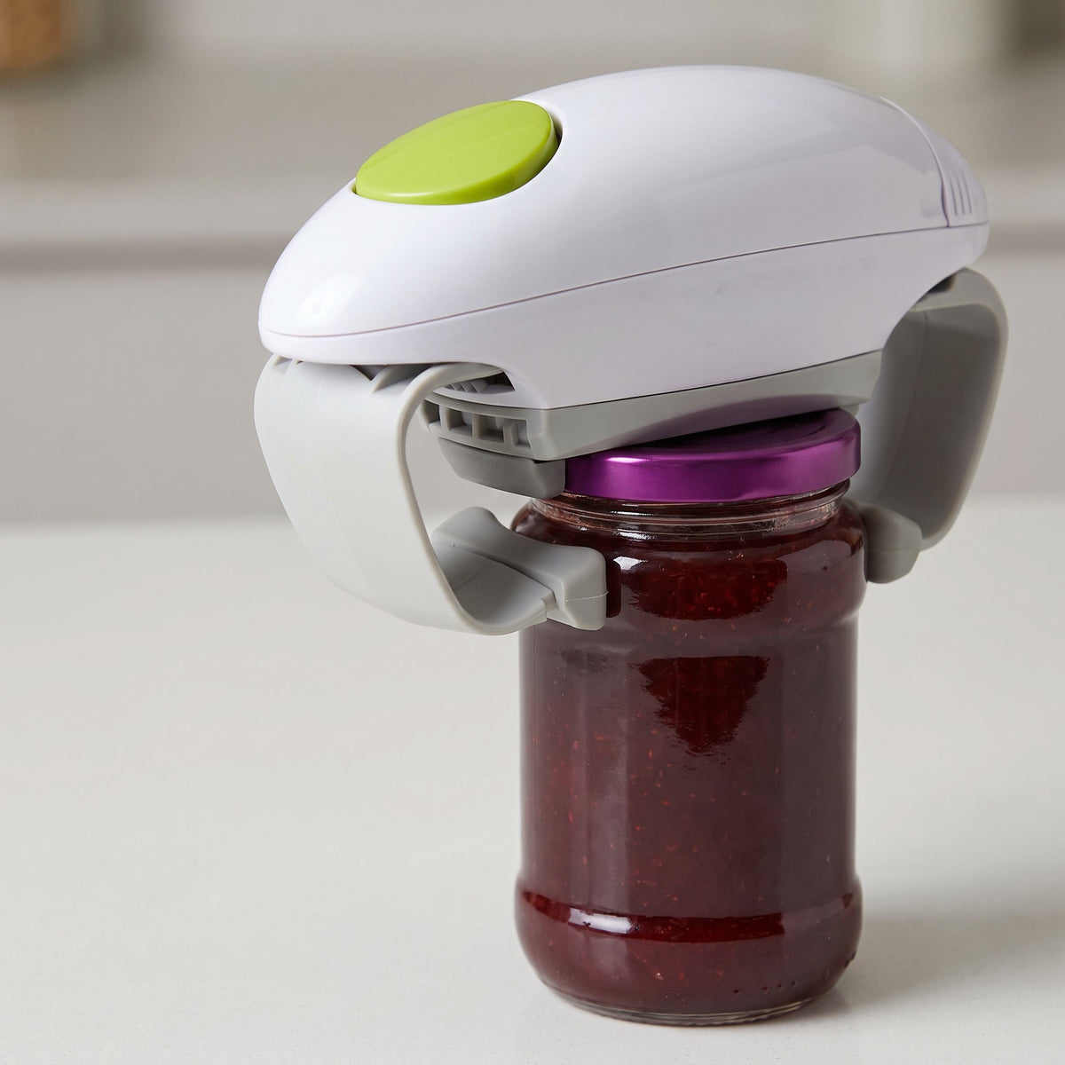 One-Touch Battery-Operated Electric Jar Opener - close-up of the gripping arms on a jar lid