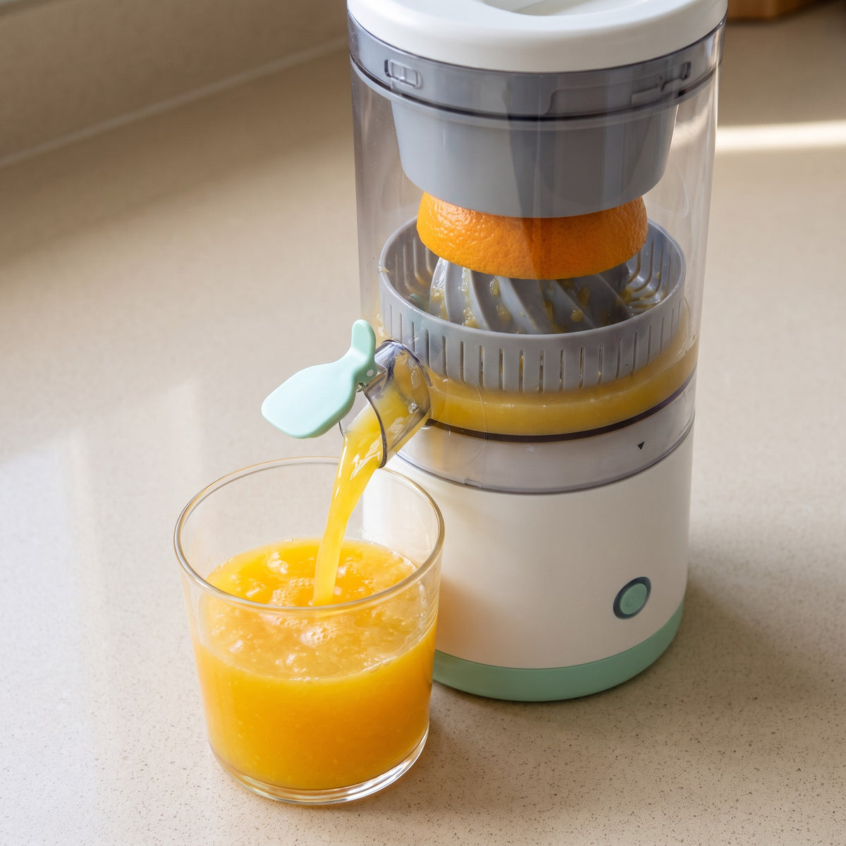 Rechargeable Electric Citrus Juicer with Spiral Reamer - close-up of the spiral reamer and juice spout