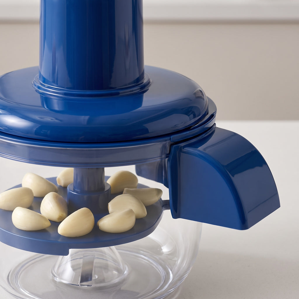 Rechargeable Electric Fruit and Vegetable Peeler with Five-Blade Head - close-up of the blue polycarbonate lid, spout and clear bowl