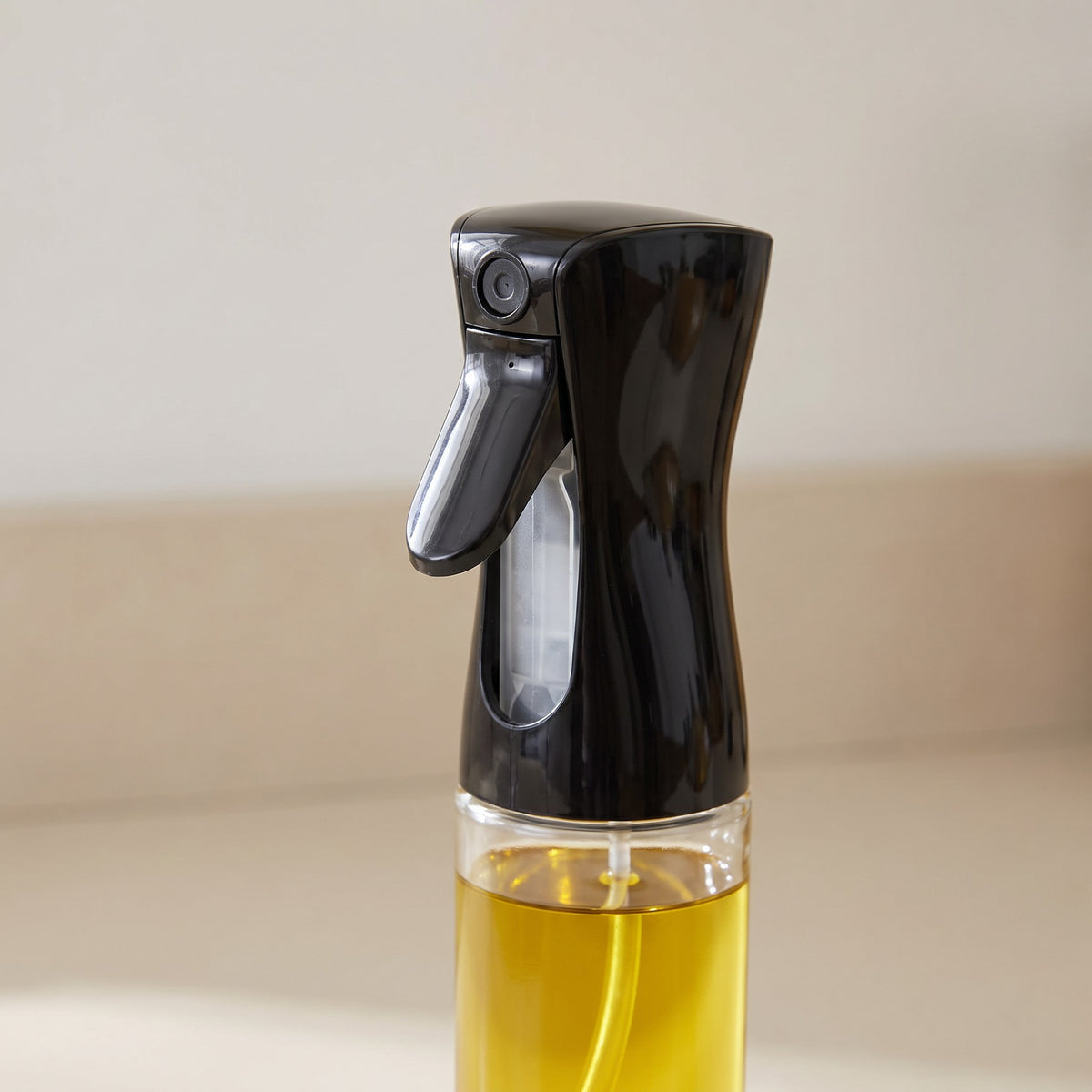 Refillable Oil Sprayer Bottle for Air Fryer - close-up of the fine mist nozzle and trigger head