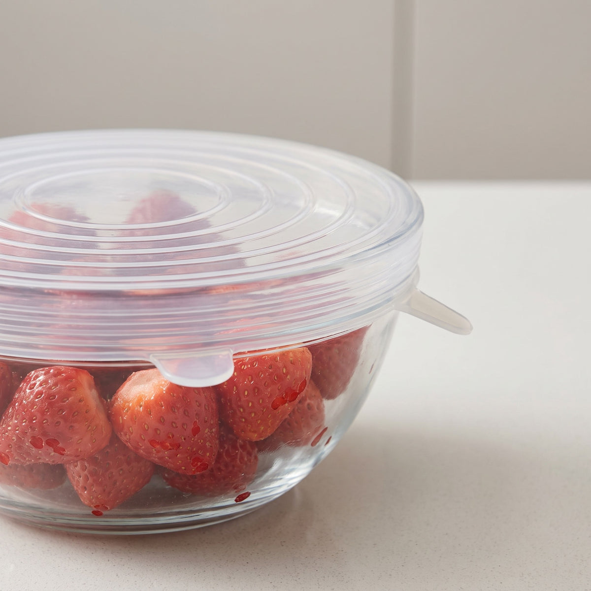 Reusable Silicone Stretch Lids for Freezer and Microwave - close-up of the clear silicone stretched over a bowl rim