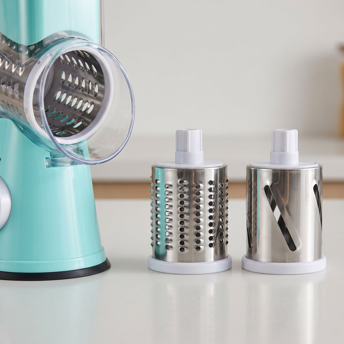 Rotary Drum Vegetable Slicer and Grater with Suction Base - close-up of the stainless steel slicing and grating drums