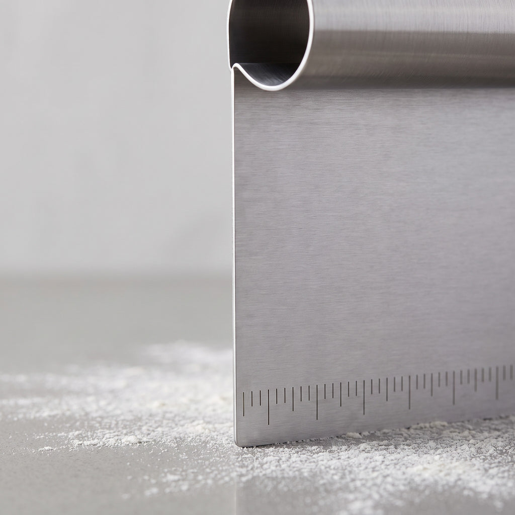 Stainless Steel Bench Scraper with Engraved Measuring Scale - close-up of the brushed steel blade and engraved measuring scale