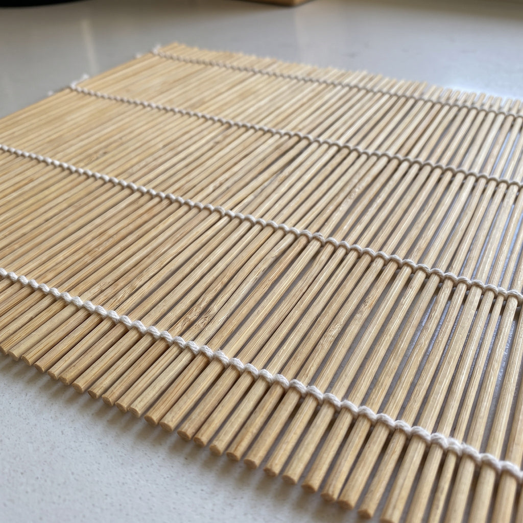Traditional Bamboo Sushi Rolling Mat for Beginners - close-up of the natural bamboo slats and cotton string weave