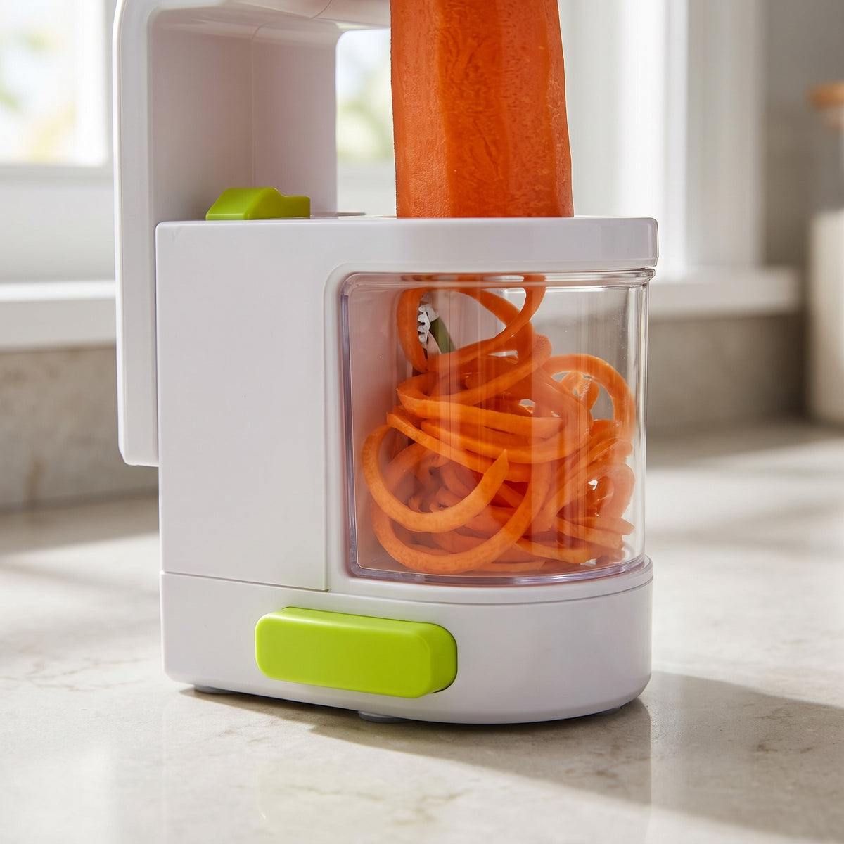 Vertical Vegetable Spiralizer for Zucchini Noodles and Curly Fries - close-up of the clear container catching carrot spirals